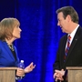 Democrat Maggie Hassan and Republican Ovide Lamontagne talk during a break in their gubernatorial debate in Henniker, N.H., on Oct. 4. Democrat Maggie Hassan and Republican Ovide Lamontagne talk during a break in their gubernatorial debate in Henniker, N.H., on Oct. 4.