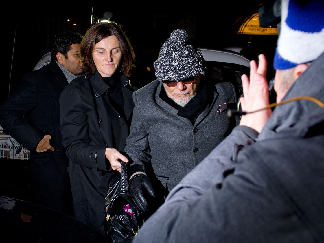 Former British rock star Gary Glitter, whose real name is Paul Gadd, returns home in central London on Sunday after he was arrested earlier in the day by British police as they investigate the mountain of sexual abuse allegations against the late TV star Jimmy Savile.