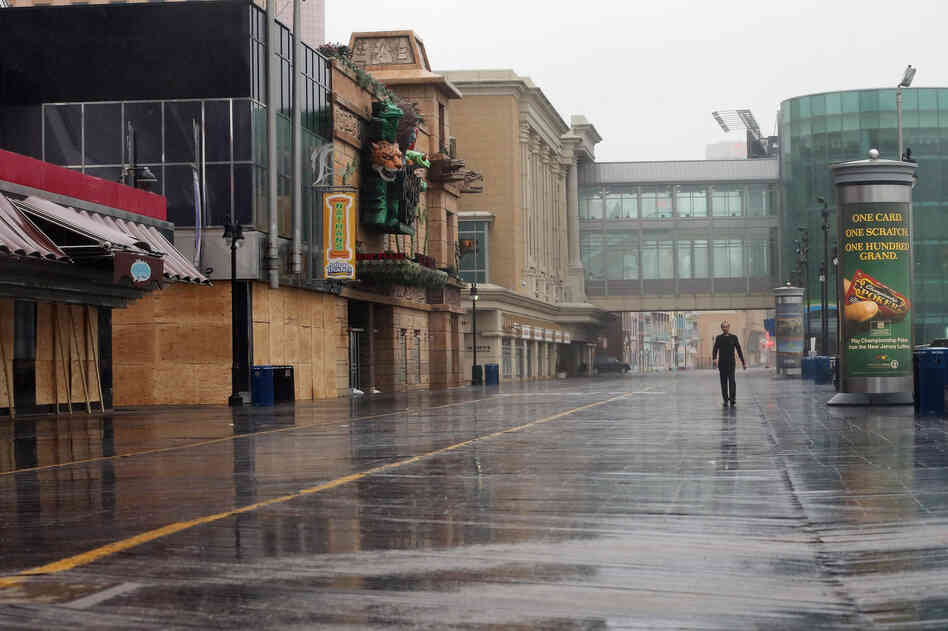 Buildings on the Atlantic City boardwalk are braced for Sandy. Gov. Chris Christie's emergency declaration is shutting down the city's casinos, and 30,000 residents are being told to evacuate.