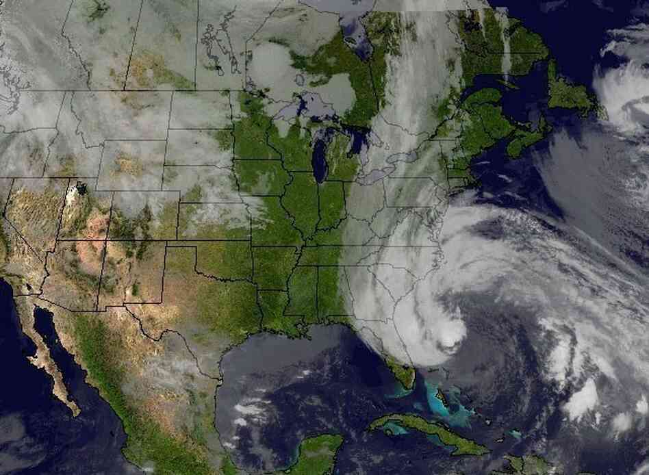Hurricane Sandy's huge cloud extends up to 2,000 miles based on a satellite image from Sunday.