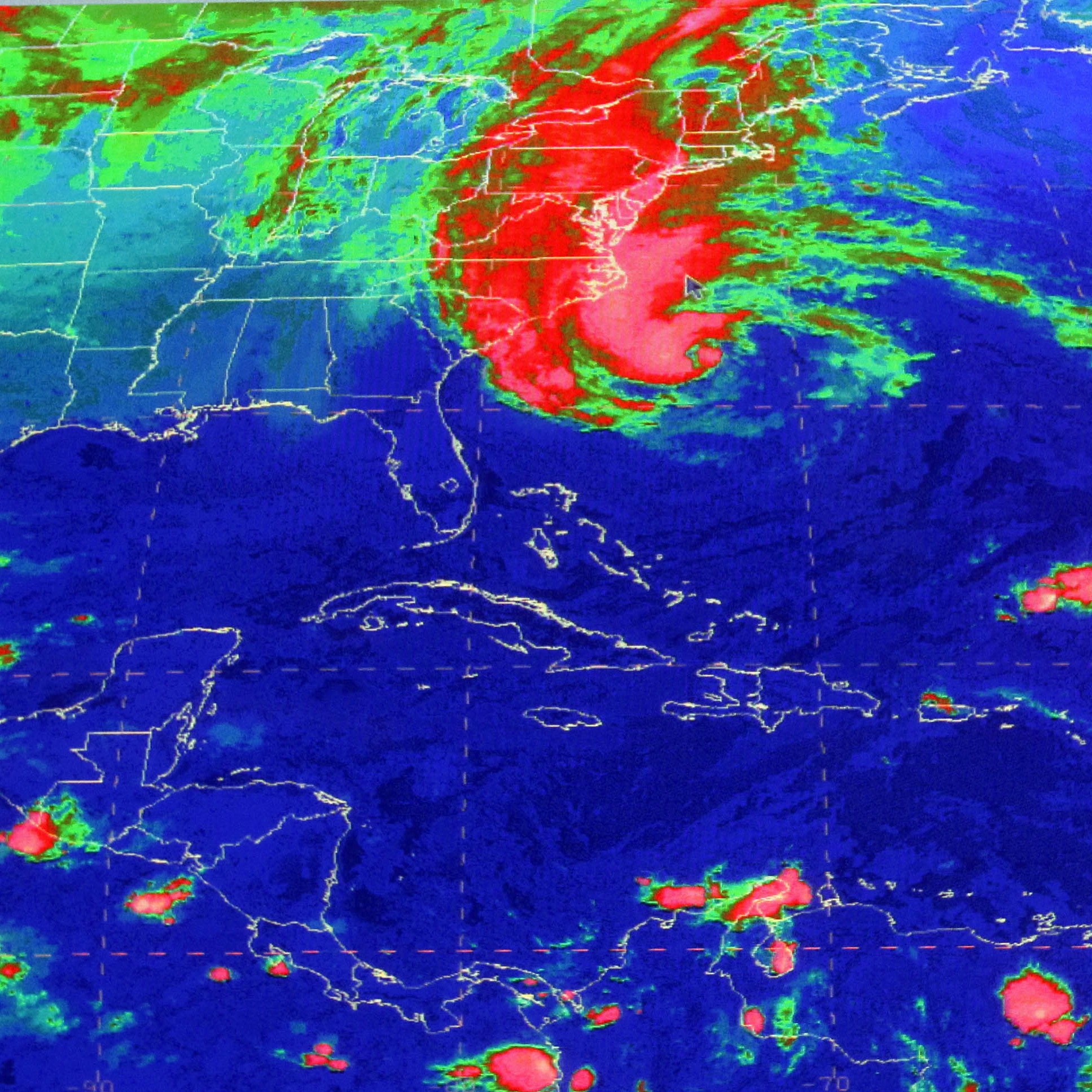 This satellite image from the National Hurricane Center in Miami shows Sandy at 10:03 a.m., Sunday.