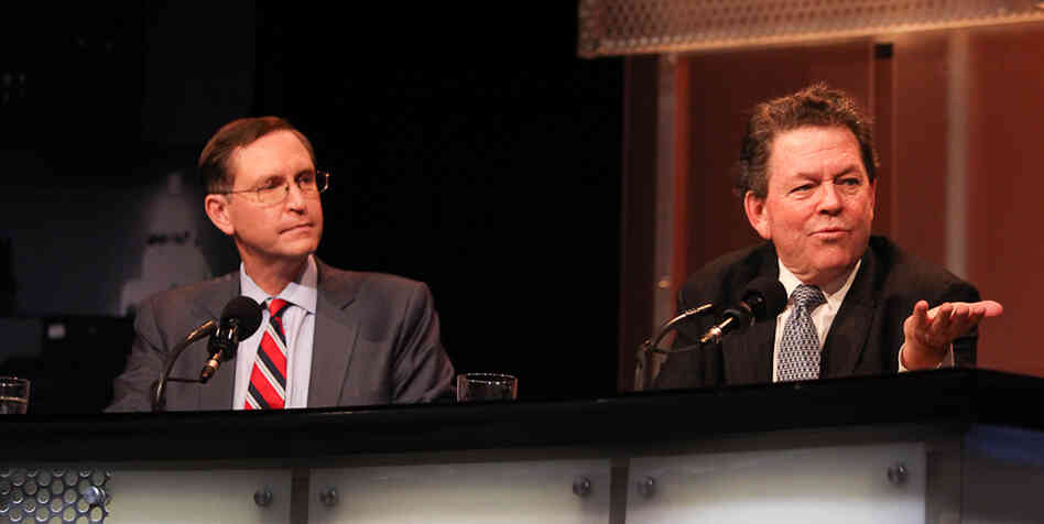 Panelists Glenn Hubbard (left) and Arthur Laffer argue for the motion "The Rich Are Taxed Enough." Panelists Glenn Hubbard (left) and Arthur Laffer argue for the motion "The Rich Are Taxed Enough."