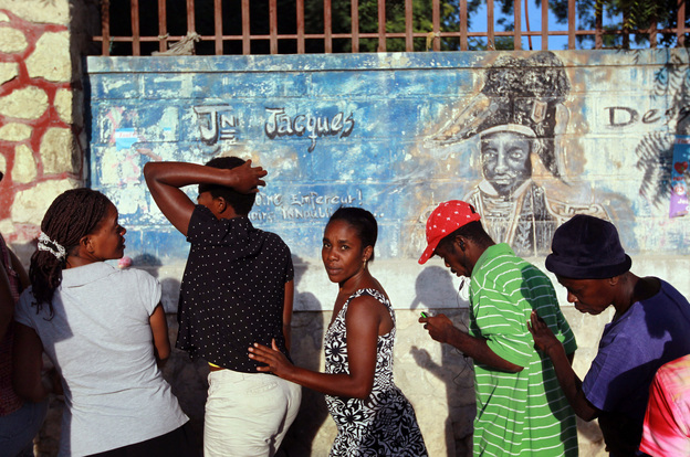 People wait to vote in Haiti's national election in Port-au-Prince, 2010.