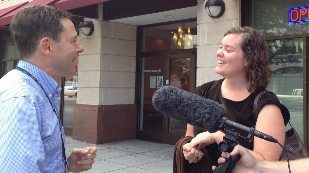 In Washington's Columbia Heights neighborhood, Claire Robertson, a grad student, talks with Scott Hensley about retail health clinics.