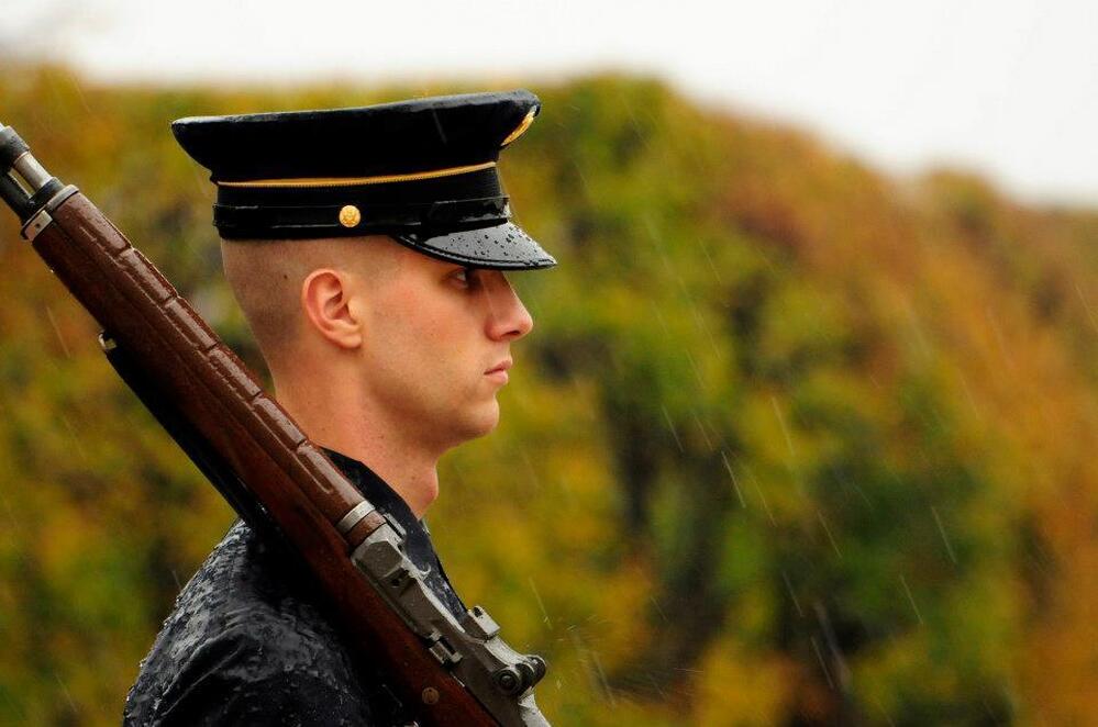 Spc. Brett Hyde, Tomb Sentinel, 3d U.S. Infantry Regiment (The Old Guard), maintains his vigil during Hurricane Sandy while guarding the Tomb of the Unknown Soldier at Arlington National Cemetery, Va.