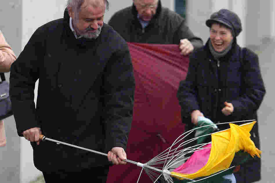 A man in Germany gets no sympathy during Emma — another storm with hurricane-strength winds, in 2008.
