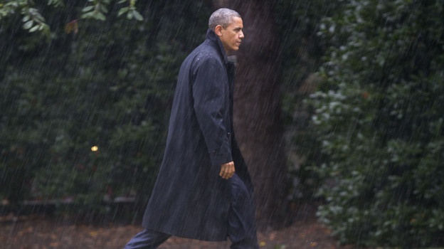 President Obama walks toward the White House on Monday after returning to Washington to monitor the government response to Hurricane Sandy.