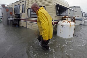 Terry Robinson checks on his flooded trailer at an RV park in Kitty Hawk, N.C. as Hurricane Sandy makes landfall on Monday.
