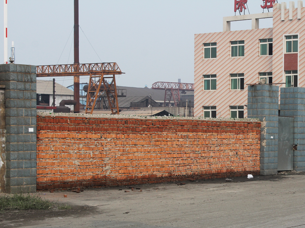 China faces overcapacity in various industries, including steel. This steel mill in the northern city of Tangshan went bankrupt in August after it expanded too quickly and the boss ending up owing banks more than $120 million. Authorities sealed the front gate with bricks.