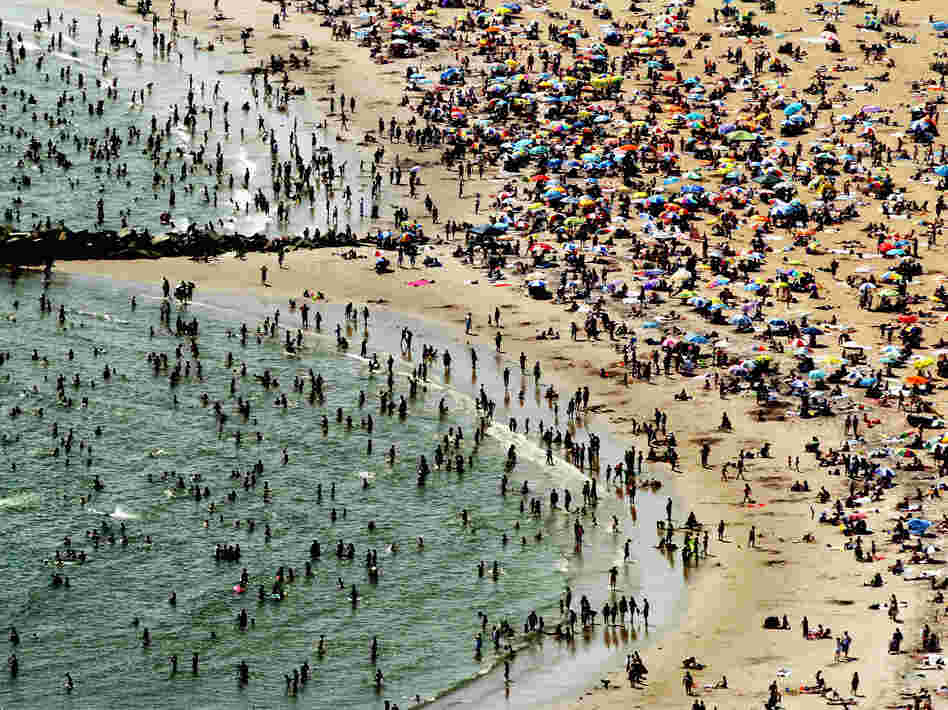 According to the National Oceanic and Atmospheric Administration, the past year through June 2012 has been the hottest year in the continental U.S. since modern record keeping started in 1895. Above, New Yorkers flocked to Coney Island to try to beat the heat in early August.