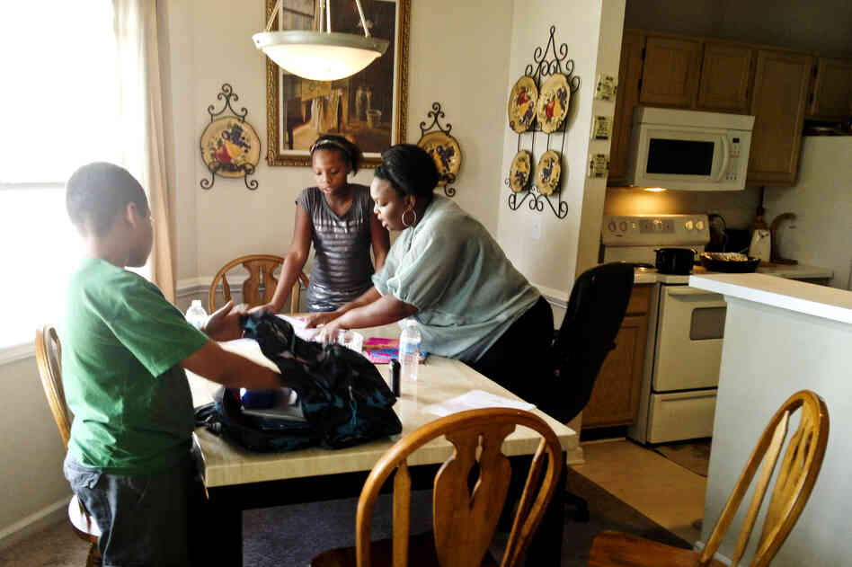 Johnita Ellerby, a single mother of four, is studying social work while working full time. She fears her progress could be erased if she loses her scholarship.