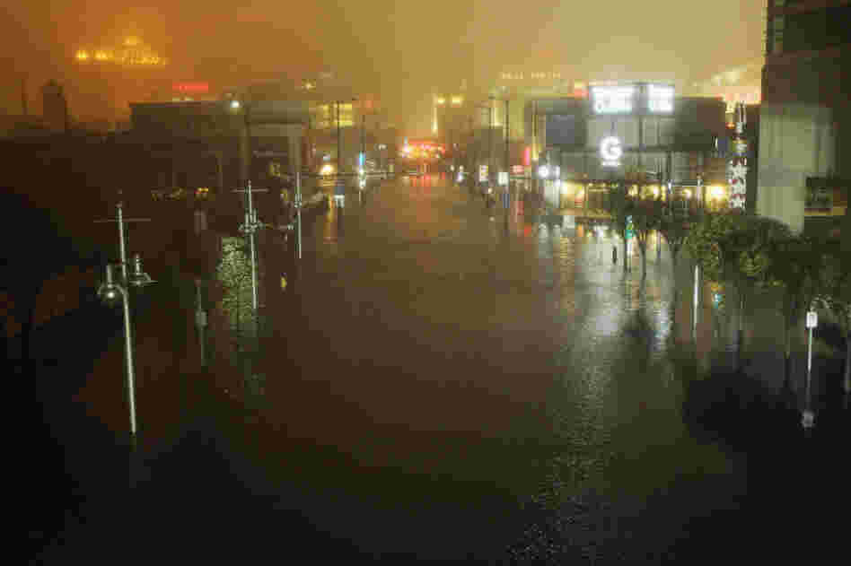 A flooded street is seen at nightfall during rains from Hurricane Sandy in Atlantic City, N.J., on Monday. The New York Times reports that 70 to 80 percent of Atlantic City was underwater.