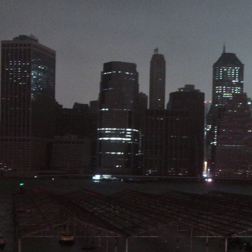 Lower Manhattan goes dark during Sandy, on Monday, as seen from Brooklyn. New York City's power company Consolidated Edison Inc., has shut down power to a large part of Lower Manhattan.