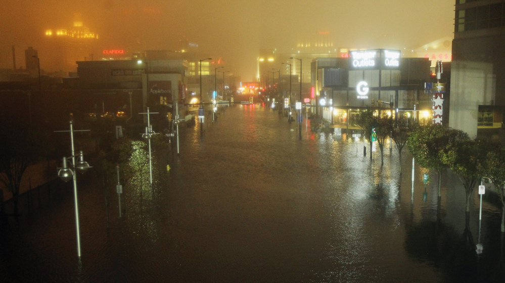 A flooded street is seen at nightfall during rains from Hurricane Sandy in Atlantic City, N.J. on Monday. Sandy made landfall over Southern New Jersey today.