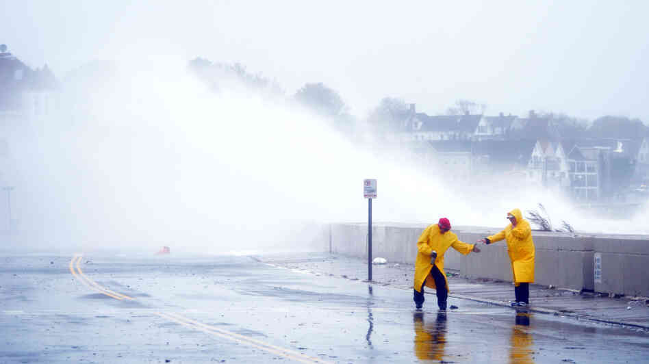 Waves crashed over a road in Winthrop, Mass., as Hurricane Sandy moved toward coastal areas Monday. Waves crashed over a road in Winthrop, Mass., as Hurricane Sandy moved toward coastal areas Monday.