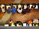 Early voters fill out ballots in Miami. Voting experts say Hurricane Sandy isn't likely to cause major disruptions — but that it would have been a far different matter had Florida taken a direct hit from the storm. Early voters fill out ballots in Miami. Voting experts say Hurricane Sandy isn't likely to cause major disruptions — but that it would have been a far different matter had Florida taken a direct hit from the storm.