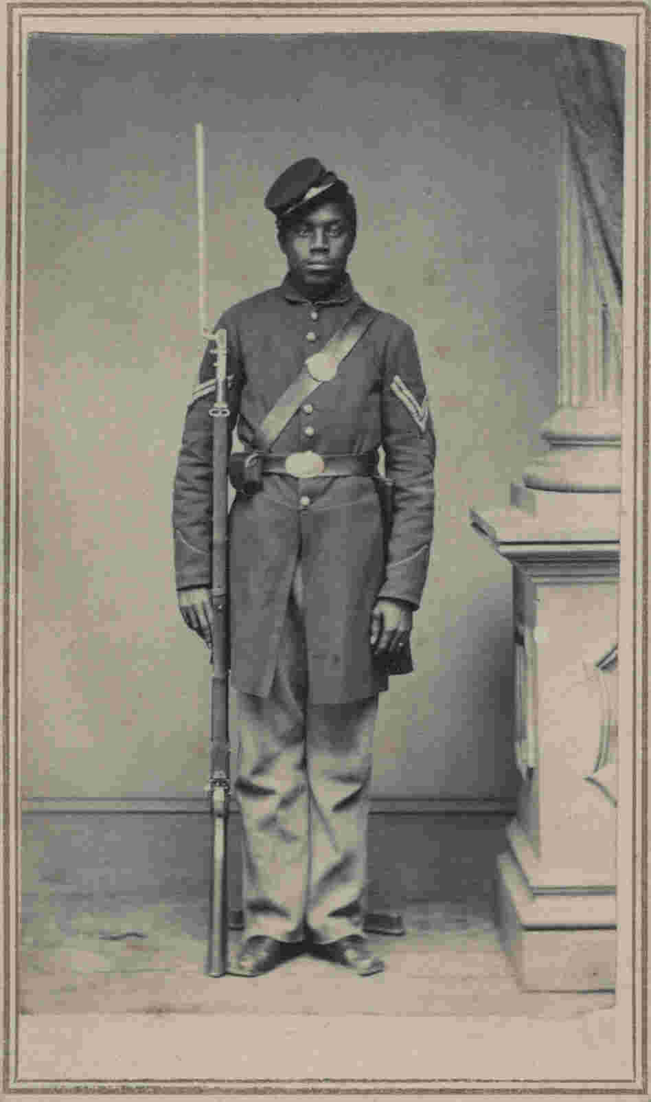 Corp. Wilson Weir was a slave when he joined the Union army at age 21. "My initial attraction to old photos was purely aesthetic, and this still continues to be the dominant motivating factor," writes Coddington. "This carte de visite meets and exceeds my criteria. ... He wears his hat at a jaunty angle, perhaps reflective of his character." Corp. Wilson Weir was a slave when he joined the Union army at age 21. "My initial attraction to old photos was purely aesthetic, and this still continues to be the dominant motivating factor," writes Coddington. "This carte de visite meets and exceeds my criteria. ... He wears his hat at a jaunty angle, perhaps reflective of his character."