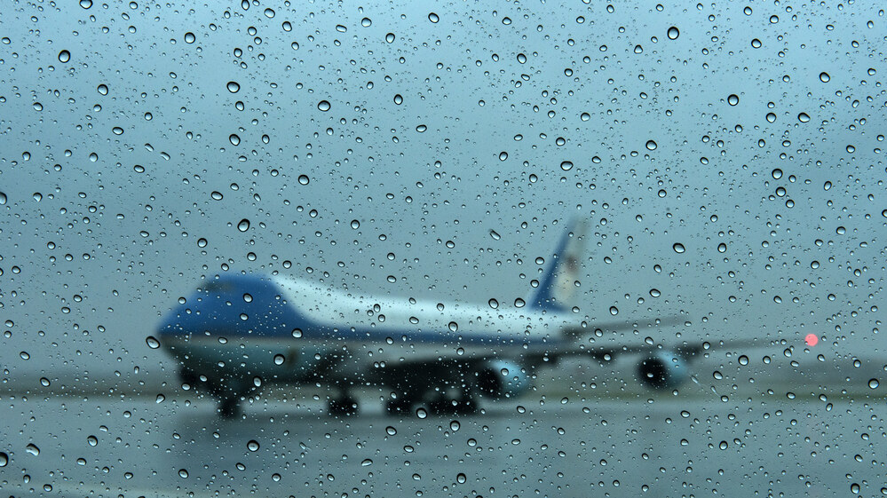 Air Force One arrives at Andrews Air Force Base in Maryland on Monday. President Obama returned from campaigning to monitor the storm.