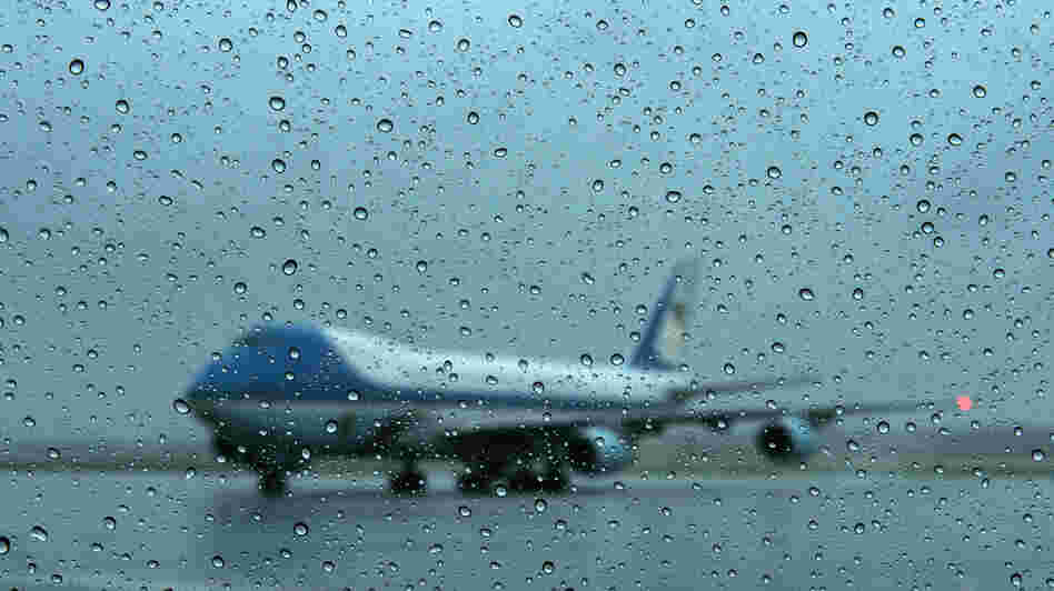 Air Force One arrives at Andrews Air Force Base in Maryland on Monday. President Obama returned from campaigning to monitor the storm.
