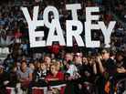 A crowd listens at a rally with former President Bill Clinton and Vice President Joe Biden in Youngstown, Ohio, on Monday. President Obama canceled his appearance to return to the White House to monitor Hurricane Sandy. Both campaigns have urged supporters whose states allow early voting to vote as soon as possible. A crowd listens at a rally with former President Bill Clinton and Vice President Joe Biden in Youngstown, Ohio, on Monday. President Obama canceled his appearance to return to the White House to monitor Hurricane Sandy. Both campaigns have urged supporters whose states allow early voting to vote as soon as possible.