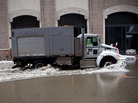 A truck drives through a flooded street caused by Hurricane Sandy in New York City's Financial District on Tuesday. A truck drives through a flooded street caused by Hurricane Sandy in New York City's Financial District on Tuesday.