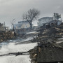Homes sit smoldering after Hurricane Sandy on Tuesday in the Breezy Point Neighborhood of the Queens. Homes sit smoldering after Hurricane Sandy on Tuesday in the Breezy Point Neighborhood of the Queens.
