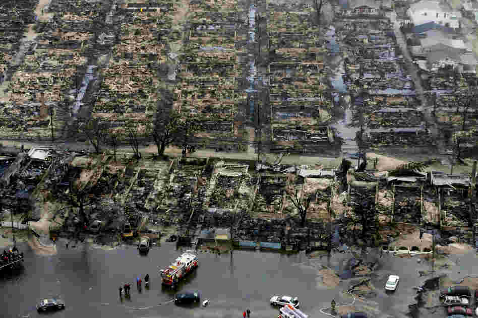 An aerial image of the burned-out homes of the Breezy Point, N.Y. After Sandy, fire and floodwaters transformed this quaint corner of the Rockaways into a smoke-filled debris field.
