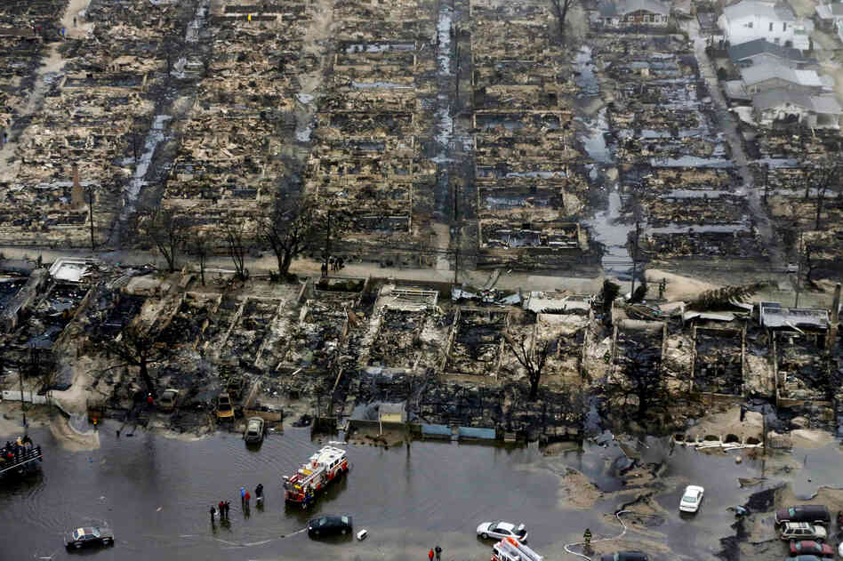 An aerial image of the burned-out homes of the Breezy Point, N.Y. After Sandy, fire and floodwaters transformed this quaint corner of the Rockaways into a smoke-filled debris field.