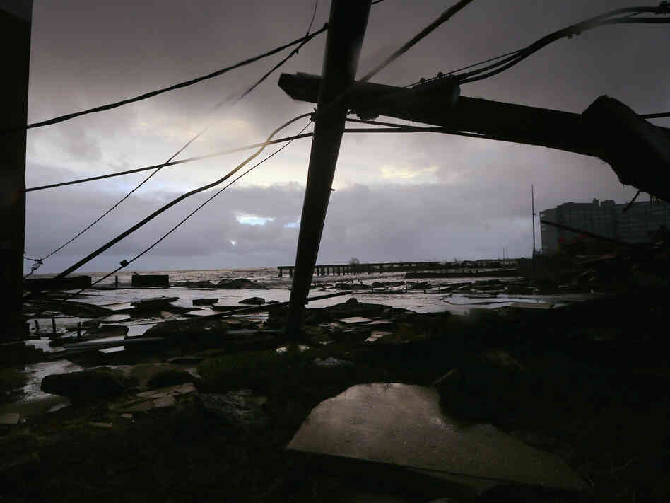 Debris and sections of a destroyed boardwalk in Atlantic City, N.J., earlier today.