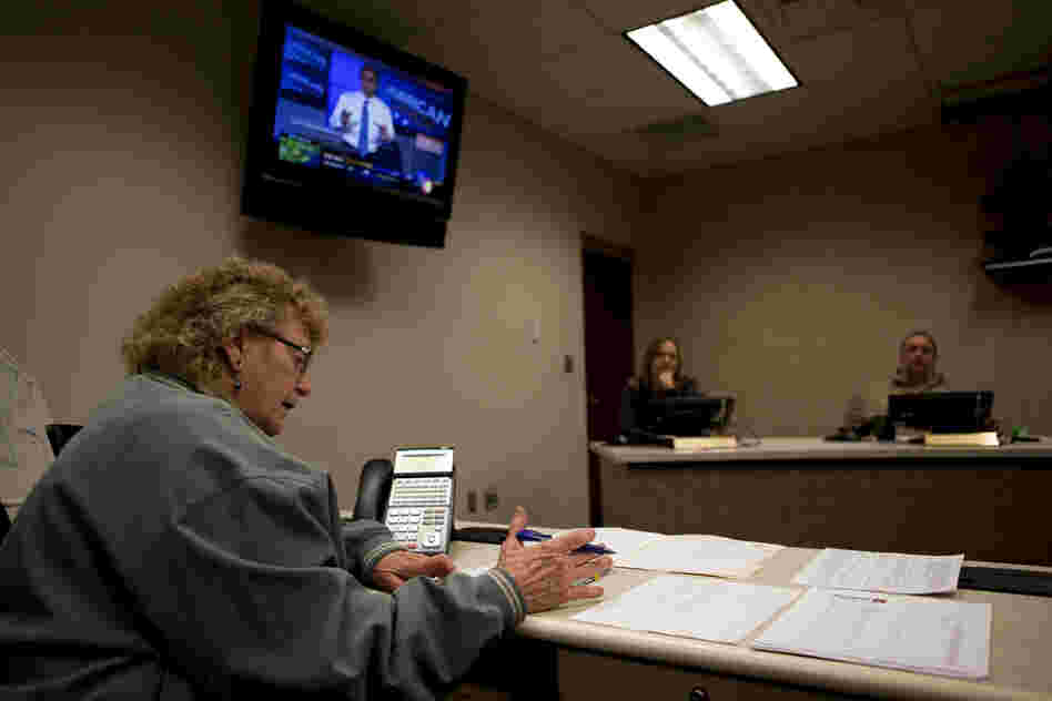 Marty Agee, director of the Raleigh County Emergency Operations Center, holds a conference call to make emergency plans for Sandy's arrival in the town of Beckley, W. Va., on Oct. 29.