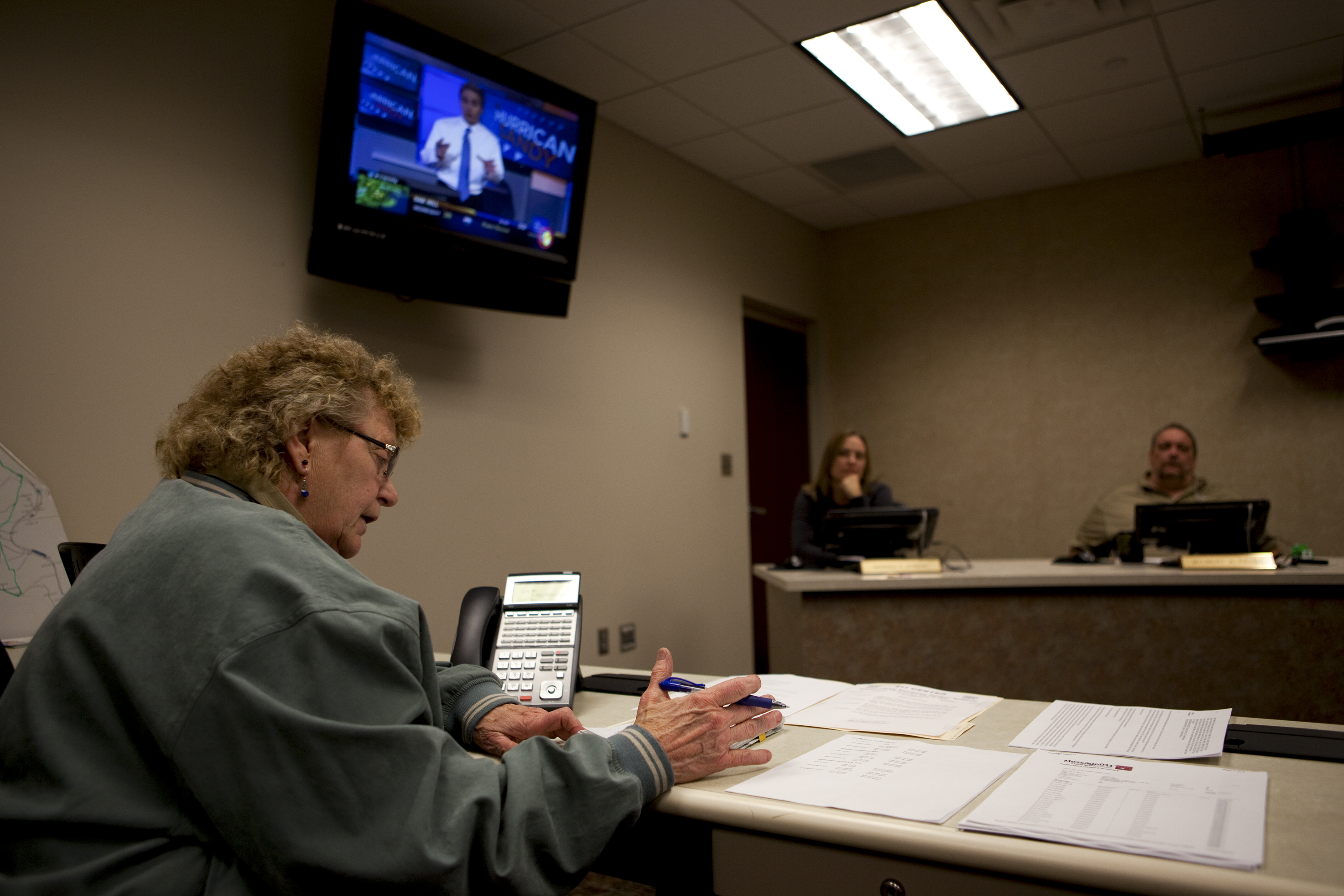 Marty Agee, director of the Raleigh County Emergency Operations Center, holds a conference call to make emergency plans for Sandy's arrival in the town of Beckley, W. Va., on Oct. 29.