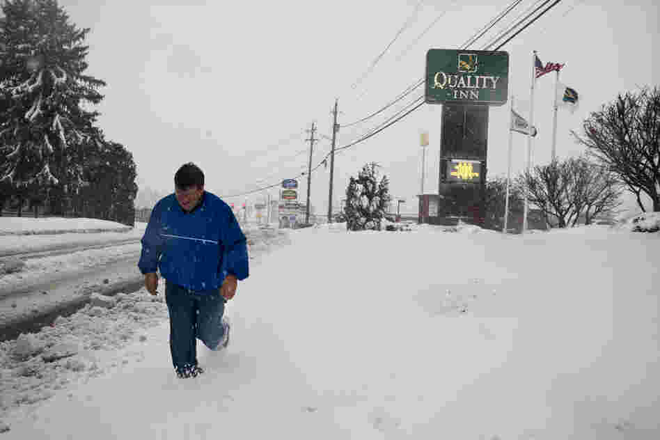 Todd Sargent, a resident of Beckley, heads out into the snow to distribute generators.