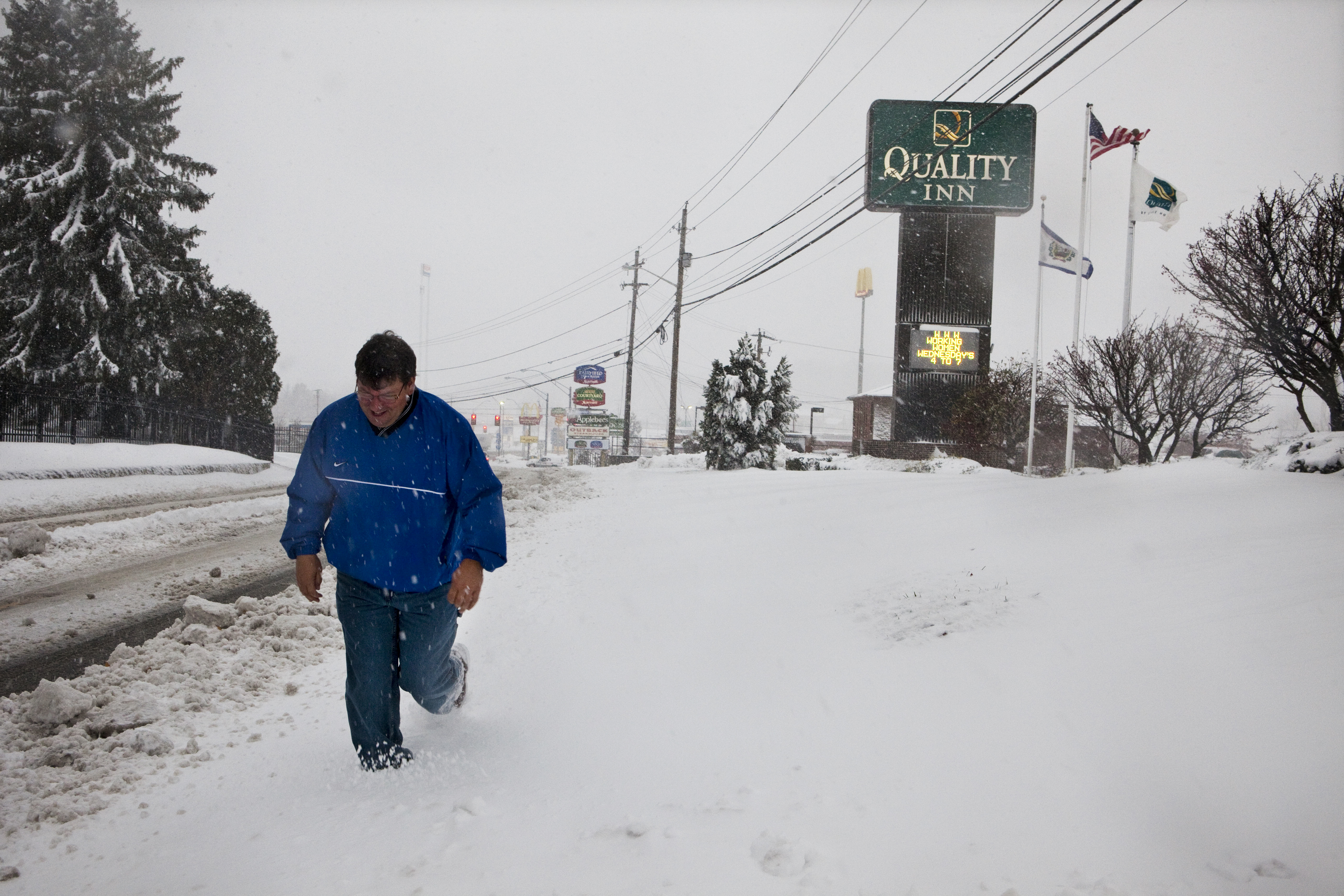 Todd Sargent, a resident of Beckley, heads out into the snow to distribute generators.