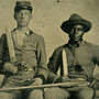 This rare portrait shows an identified Confederate noncommissioned officer, Sgt. Andrew Martin Chandler (left), and his named slave, Silas Chandler (right). It is the only Confederate photograph in the book by Rod Coddington, African American Faces of the Civil War. Born into slavery, Silas "was one of thousands of slaves who served as [body servants] during the war," writes Coddington.