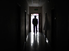 A man walks through a former unofficial, or "black," jail in Beijing, in 2009. It's estimated that thousands of Chinese lodging protests against the government are illegally detained in secret sites such as this one, even though the government says they don't exist. A man walks through a former unofficial, or "black," jail in Beijing, in 2009. It's estimated that thousands of Chinese lodging protests against the government are illegally detained in secret sites such as this one, even though the government says they don't exist.