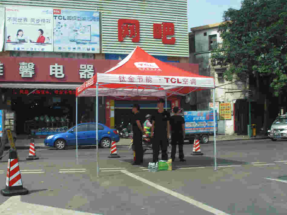 Police stand on watch on the streets of Shaxi, China, following three days of riots in June.