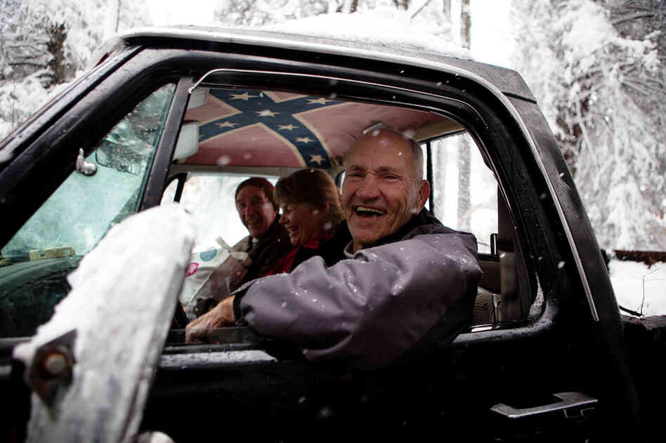 From left, Dale McKey, Karin McKey and George Secrist return home from an outing into the snow on Tuesday. From left, Dale McKey, Karin McKey and George Secrist return home from an outing into the snow on Tuesday.