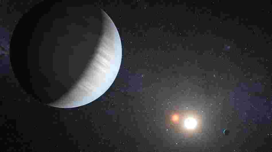 This artist's concept illustrates Kepler-47, the first transiting circumbinary system — multiple planets orbiting two suns — 4,900 light-years from Earth, in the constellation Cygnus.