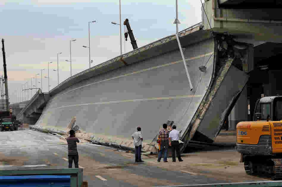 Eight bridges have collapsed around China since 2011. Here, government investigators examine a recently built entrance ramp that collapsed this summer in the northeastern city of Harbin, killing three people. Local residents believe government corruption and substandard materials are to blame.