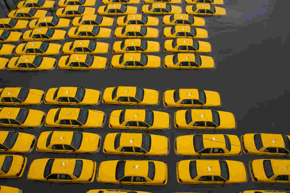 A parking lot full of yellow cabs is flooded as a result of Hurricane Sandy in Hoboken, N.J.