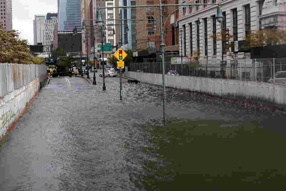The Brooklyn Battery Tunnel is flooded after a tidal surge caused by Sandy. According to The Associated Press, it's now thought there have been at least 33 deaths, including at least 17 in New York State.