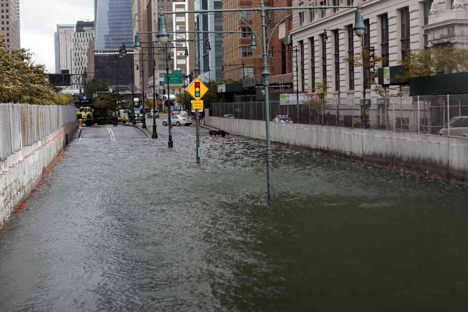 The Brooklyn Battery Tunnel is flooded after a tidal surge caused by Sandy. According to The Associated Press, it's now thought there have been at least 33 deaths, including at least 17 in New York State.