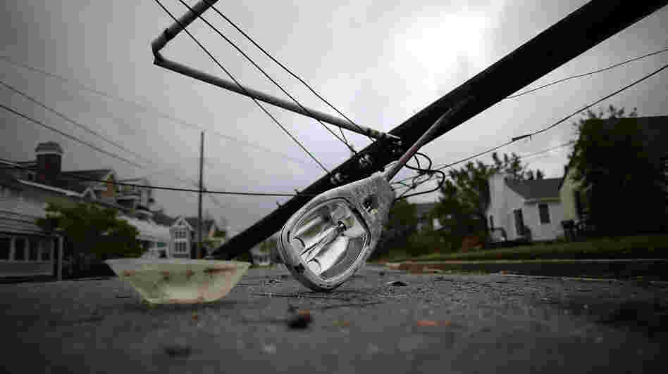 A street light and utility pole brought down by Hurricane Sandy lay on the street in Avalon, N.J. About 2.5 million customers had no power Tuesday in New Jersey. A street light and utility pole brought down by Hurricane Sandy lay on the street in Avalon, N.J. About 2.5 million customers had no power Tuesday in New Jersey.