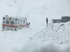An ambulance is stuck in over a foot of snow off of Highway 33 West, near Belington, W.Va. on Oct. 30. Superstorm Sandy buried parts of West Virginia under more than a foot of snow. An ambulance is stuck in over a foot of snow off of Highway 33 West, near Belington, W.Va. on Oct. 30. Superstorm Sandy buried parts of West Virginia under more than a foot of snow.