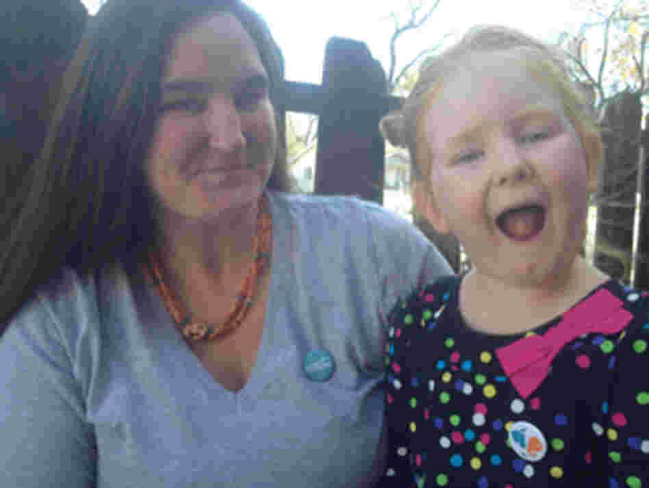Abbie Evans is now happy with an NPR pin.