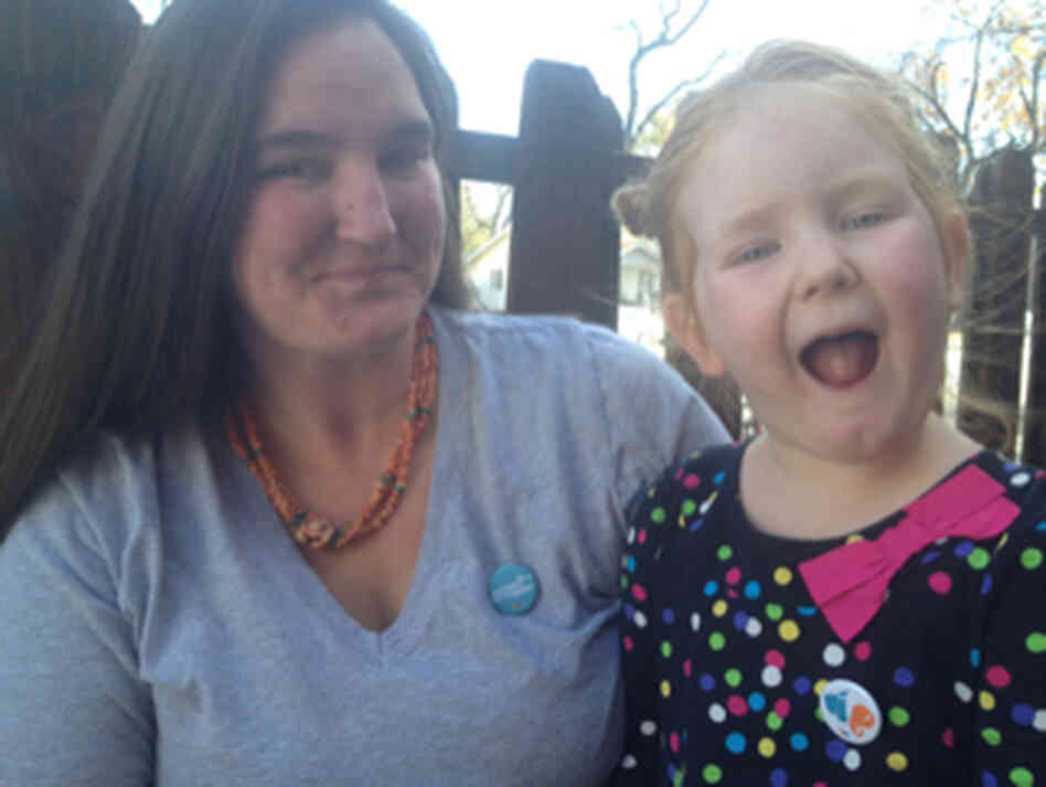 Abbie Evans is now happy with an NPR pin.