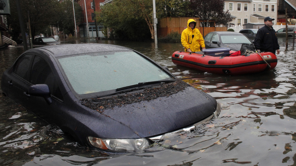 Rescue in Hoboken: Much of the New Jersey city remains flooded and the National Guard has been called in to help rescue stranded residents. Tuesday, this was the scene on one of the city's flooded streets.