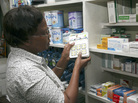Dr. Esther Dalizu holds a pack of Coartem Malaria drugs in a pharmacy in Nairobi, Kenya, last year. Dr. Esther Dalizu holds a pack of Coartem Malaria drugs in a pharmacy in Nairobi, Kenya, last year.