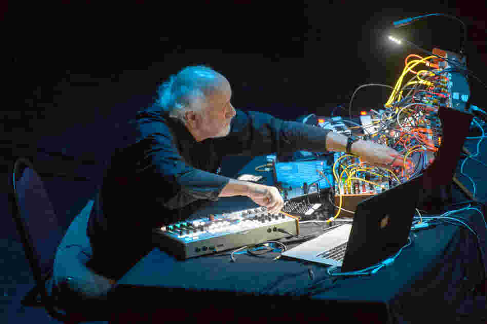 Morton Subotnick works the controls for a synthesizer originally designed by Don Buchla in the 1960s. Subotnick used a similar one to record Silver Apples of the Moon.