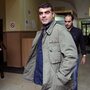 Journalist Kostas Vaxevanis waits to appear in court in Athens on Monday. Vaxevanis was arrested for the publication of 2,059 names of people alleged to have accounts in a Swiss bank. Journalist Kostas Vaxevanis waits to appear in court in Athens on Monday. Vaxevanis was arrested for the publication of 2,059 names of people alleged to have accounts in a Swiss bank.